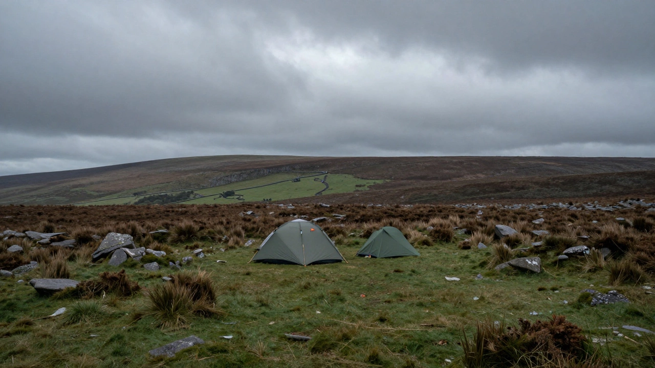 A lone small tent in the remote, rocky moorland of Dartmoor National Park.